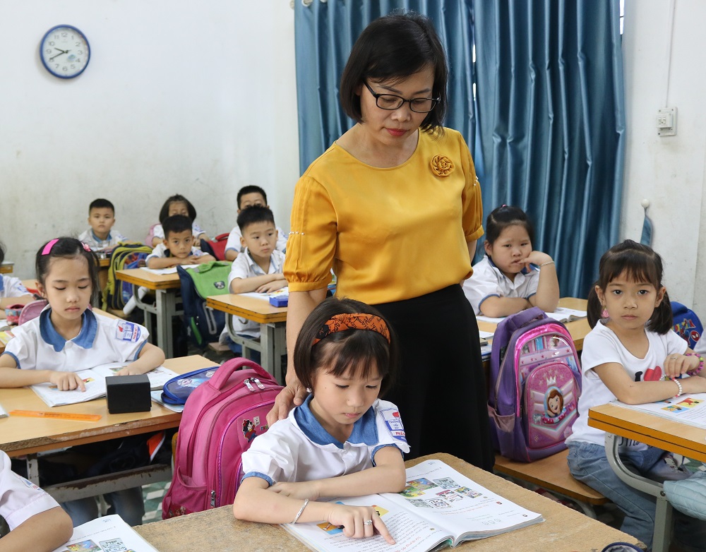 Nỗ lực chuẩn bị giáo viên các môn mang tính chuyên biệt thực hiện chương trình mới - Ảnh minh hoạ 2